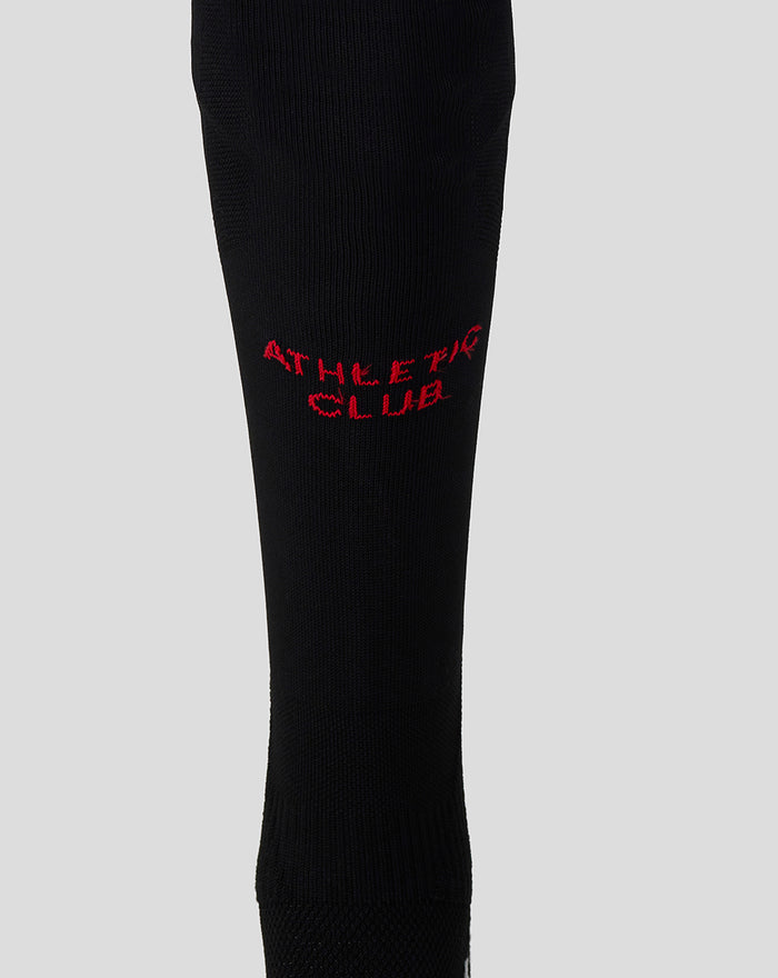 Black Athletic Club fourth kit junior sock with red embroidered emblem on the lower leg.