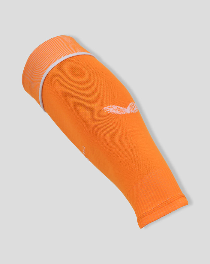 Side view of orange goalkeeper sock with white folded cuff and brand logo on the calf.