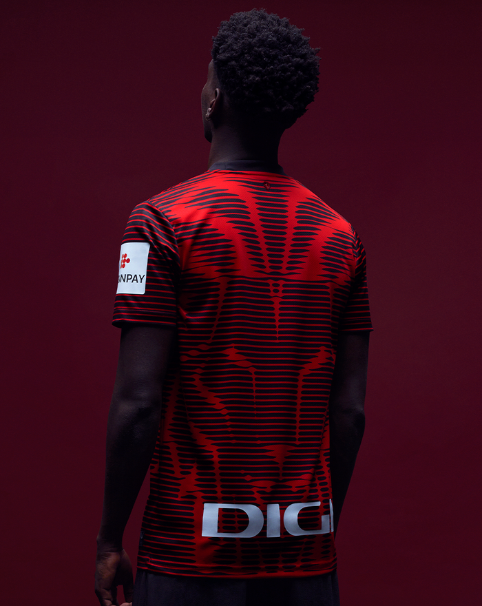 Back view of a red and black graphic Athletic Club 4th short sleeve women's shirt.